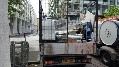 Trucks transporting builders waste from a Barnet site