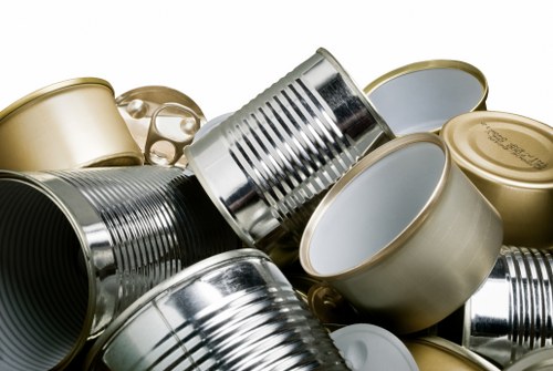 Workers using protective equipment during garden waste removal